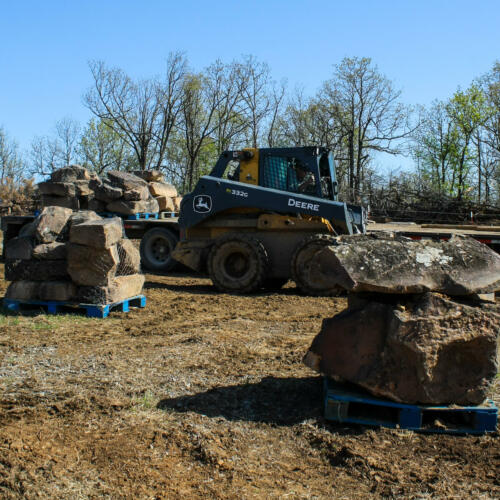 mossy boulders on pallets